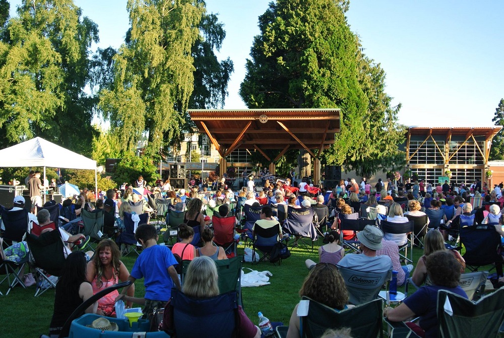 Families gather at an outdoor summer concert near Seattle in Puyallup