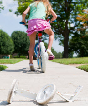 how to teach kid to ride bike without training wheels