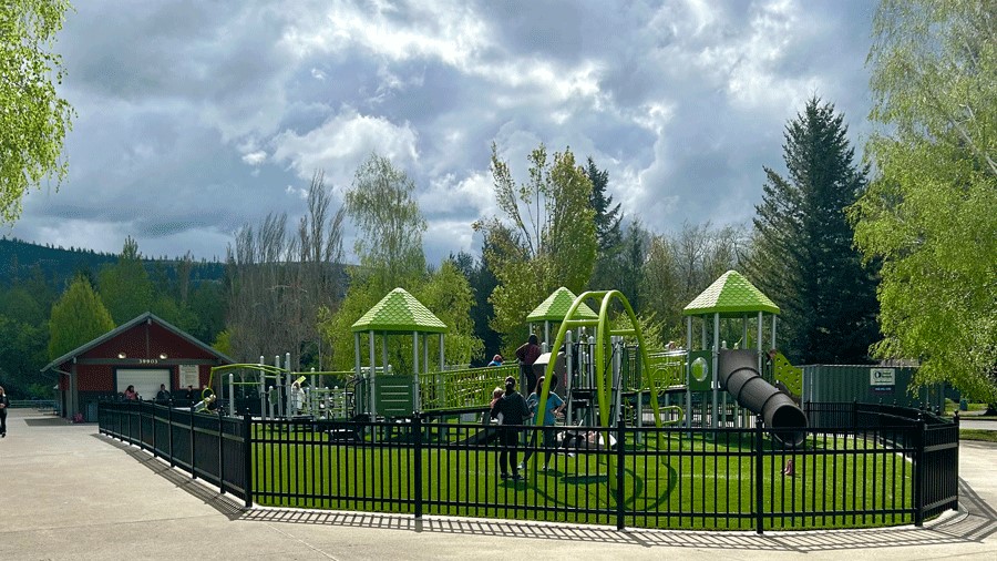 A view of the new playground in Snoqualmie with adaptive playground equipment.