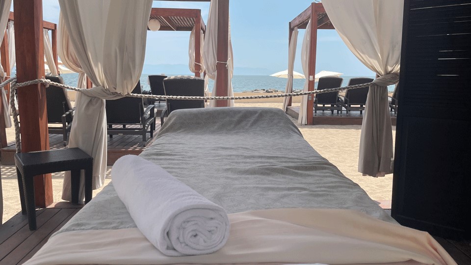 A towel on a massage table near the ocean in Puerto Vallarta