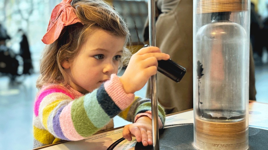 experimenting at Pacific Science Center, a top place for indoor birthday parties near Seattle