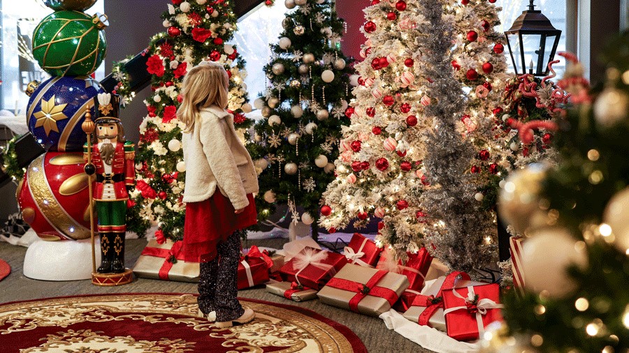 young girl in the VIP lounge of Kringle's Inventionasium, a Santa workshop experience for Seattle families