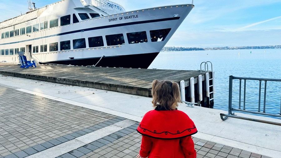 young girl waiting to board the Spirit of Seattle Argosy Christmas Ship, a Seattle holiday tradition