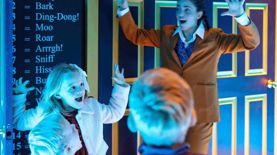 hidden door reveals silly sounds at Kringle's Inventionasium, a Seattle holiday experience for families