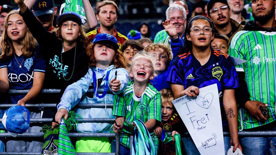 Kid fans cheer on the Sounders who will be hosting FIFA World Cup in Seattle in 2025