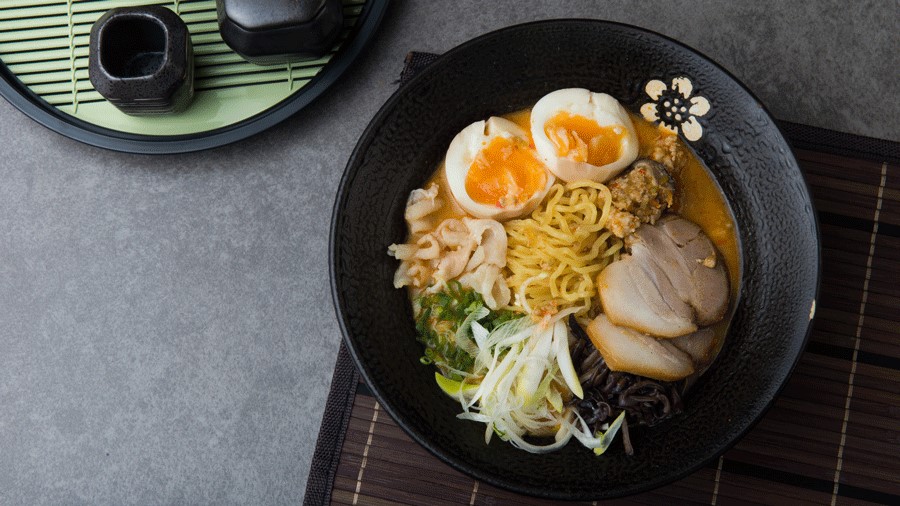 bowl of ramen on a table at a Seattle restaurant serving comfort food