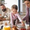 Family sharing a dairy-rich breakfast together on a busy morning