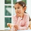 a thoughtful child looks to the side as she builds memory skills