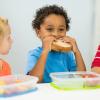 Three kids at school eating a quick and easy lunch