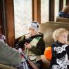 Two kids enjoying a Halloween train ride near Seattle, a fun fall activity for the whole family