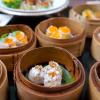 Bamboo baskets filled with different dumplings at a Seattle dumpling restaurant