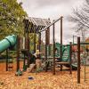 young girl climbing playground structure at Lakewood Park, a fun activity for Seattle families this weekend