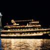 Argosy Christmas cruise ship on Elliot Bay with a view of the Space Needle, a fun Seattle holiday tradition for families