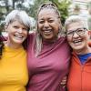 A group of women wearing colorful shirts don't think too much about how they look