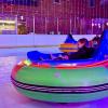 A kid spins in an ice bumper car at Sprinker Rec Center in Tacoma during ice lights