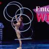 "Enter to Win" text over acrobatic performer