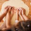 parent and child making valentine's day treats together