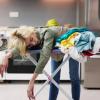 exhausted mom on laundry pile