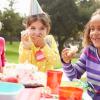 group of kids having an outdoor birthday party