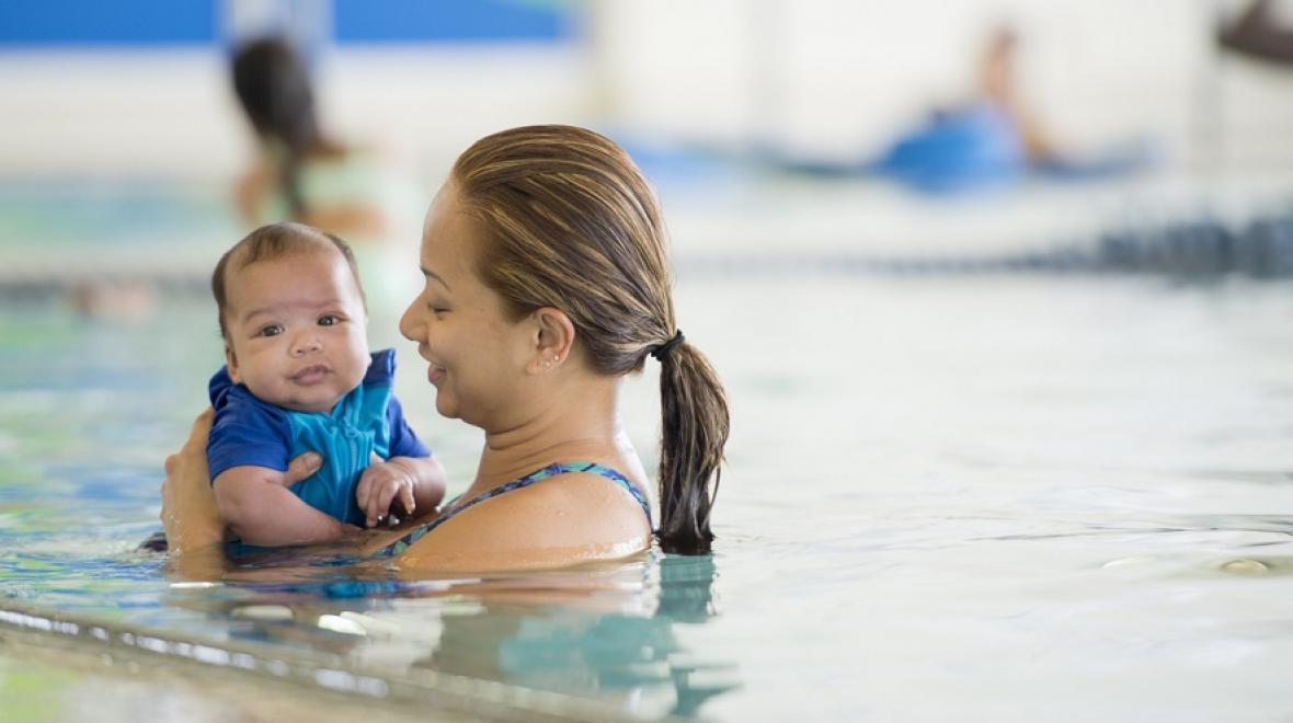 Mom and baby in a pool