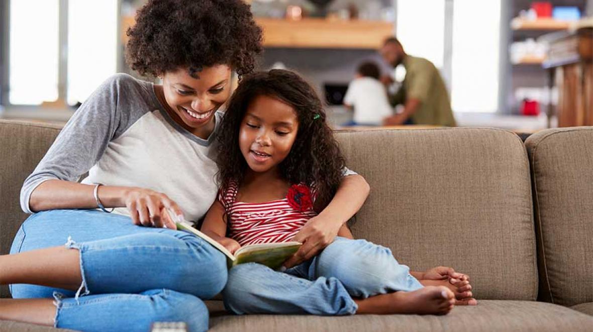 reading mom and daughter