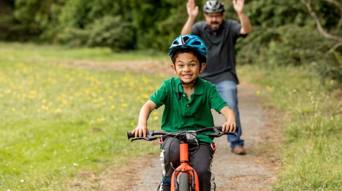 best way to teach a kid to ride a bike