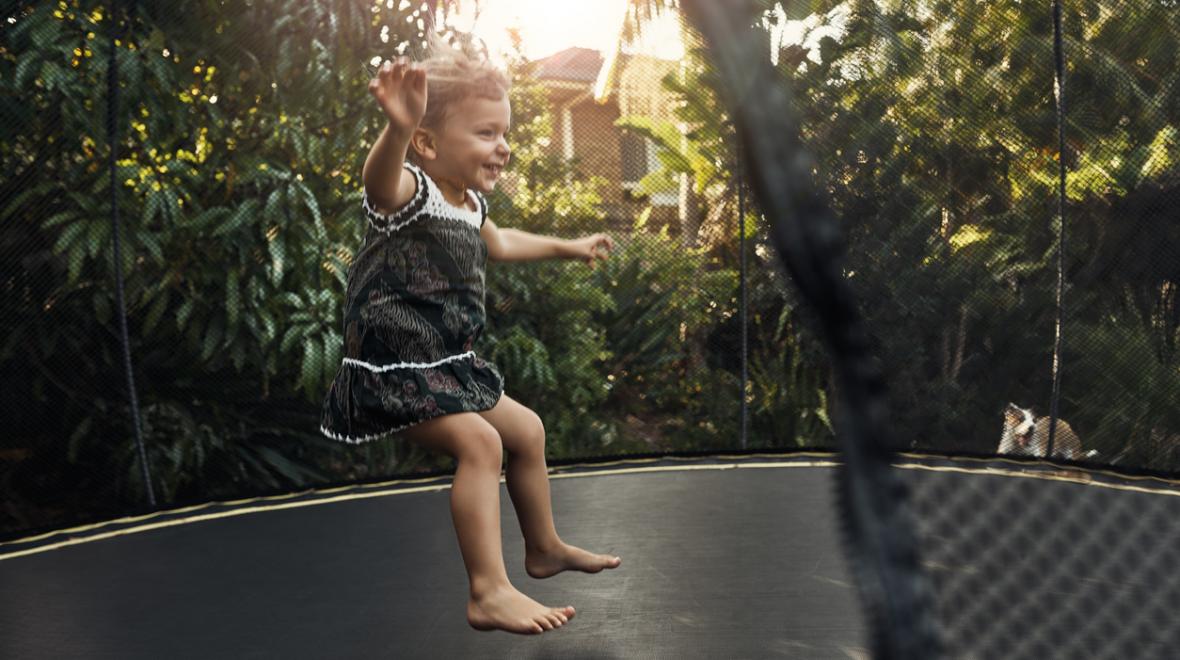 little girl on a trampoline