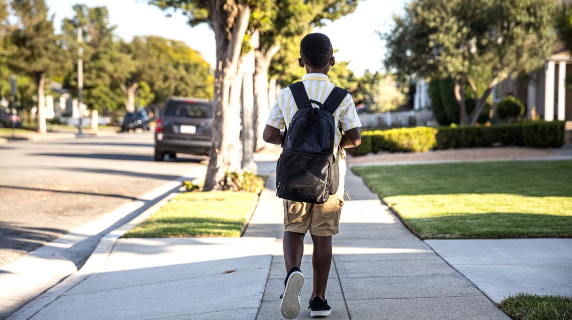 boy walking to school