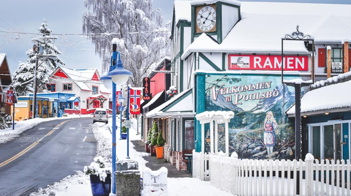 Downtown Poulsbo in the winter with snow on the buildings 
