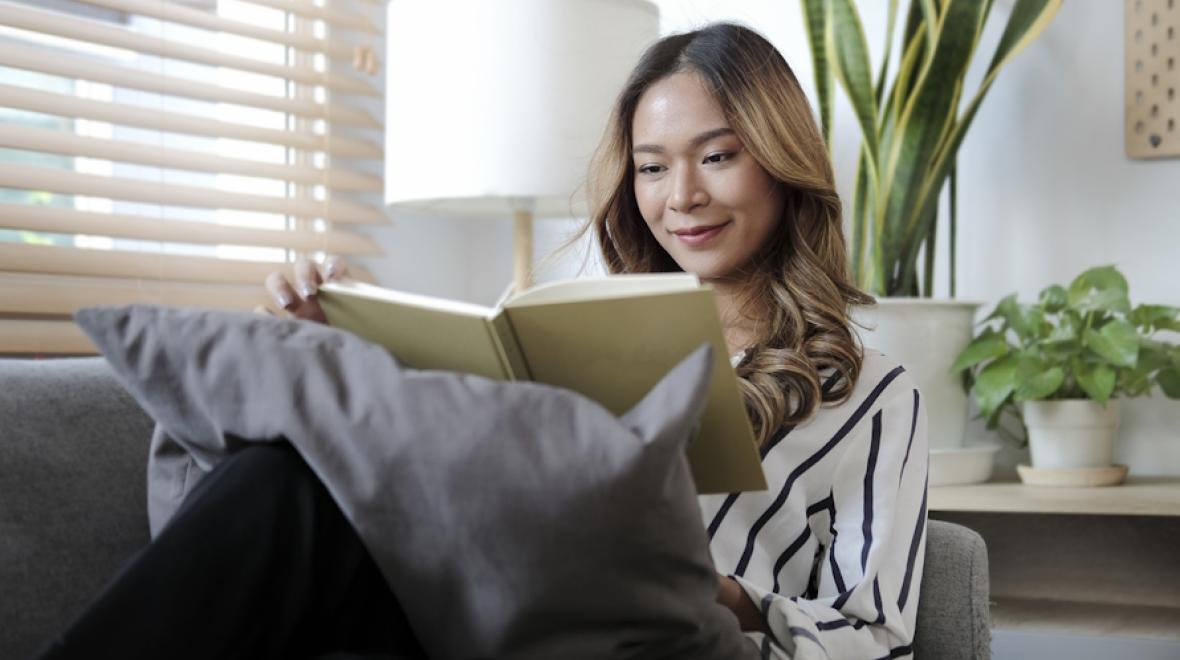 Adult woman reading a book