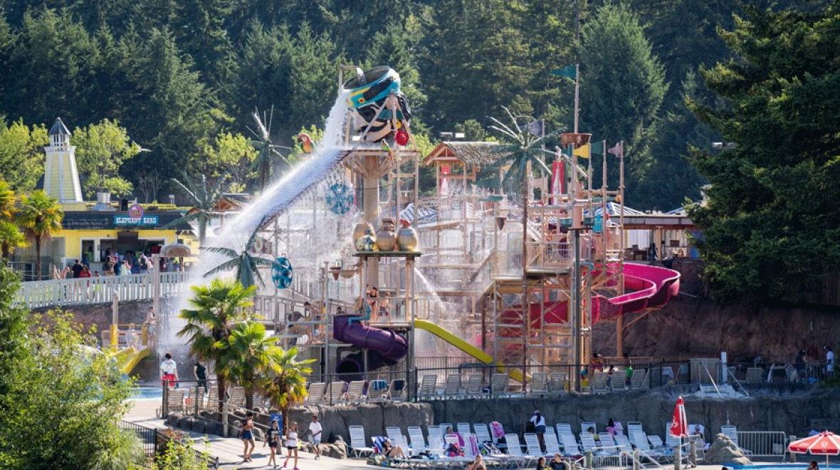 Hook's Lagoon water slides and spray features on a sunny day at Wild Waves Theme & Water Park near Seattle