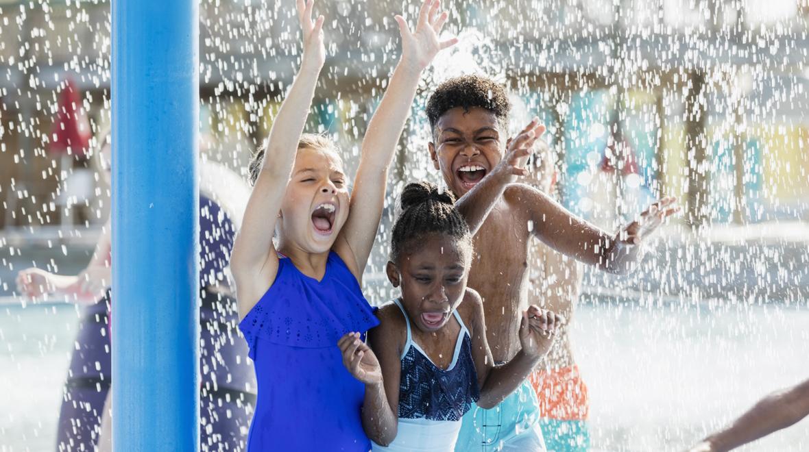 Kids playing on a warm summer day at a Seattle or Bellevue area splash park