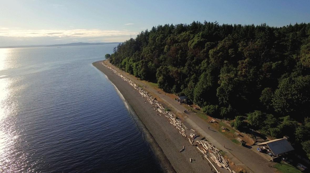 An aerial view of Lincoln Park shoreline and West Seattle bike path for families