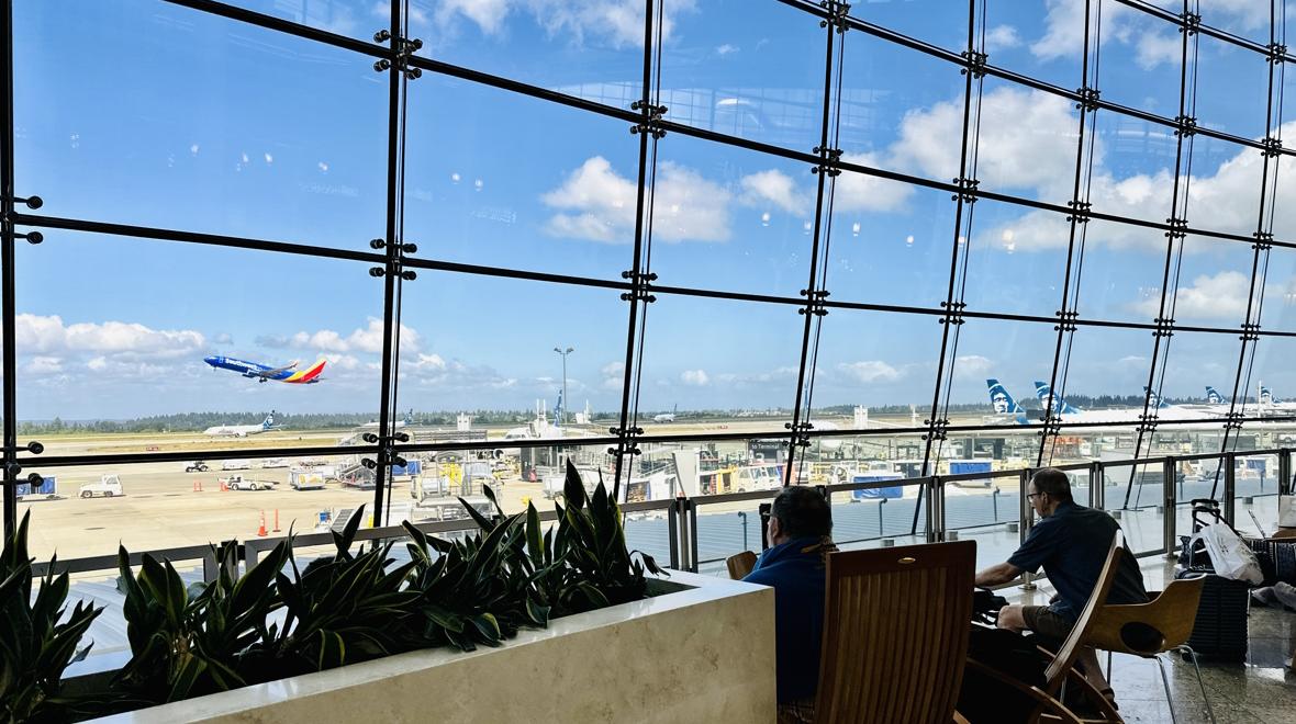 The window wall at the Central Terminal at SeaTac airport is fun to check out with kids