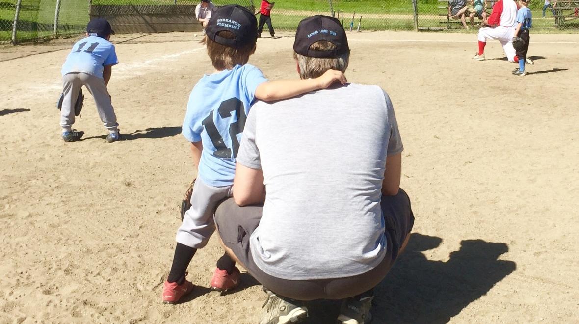 Youth sports baseball dad and son