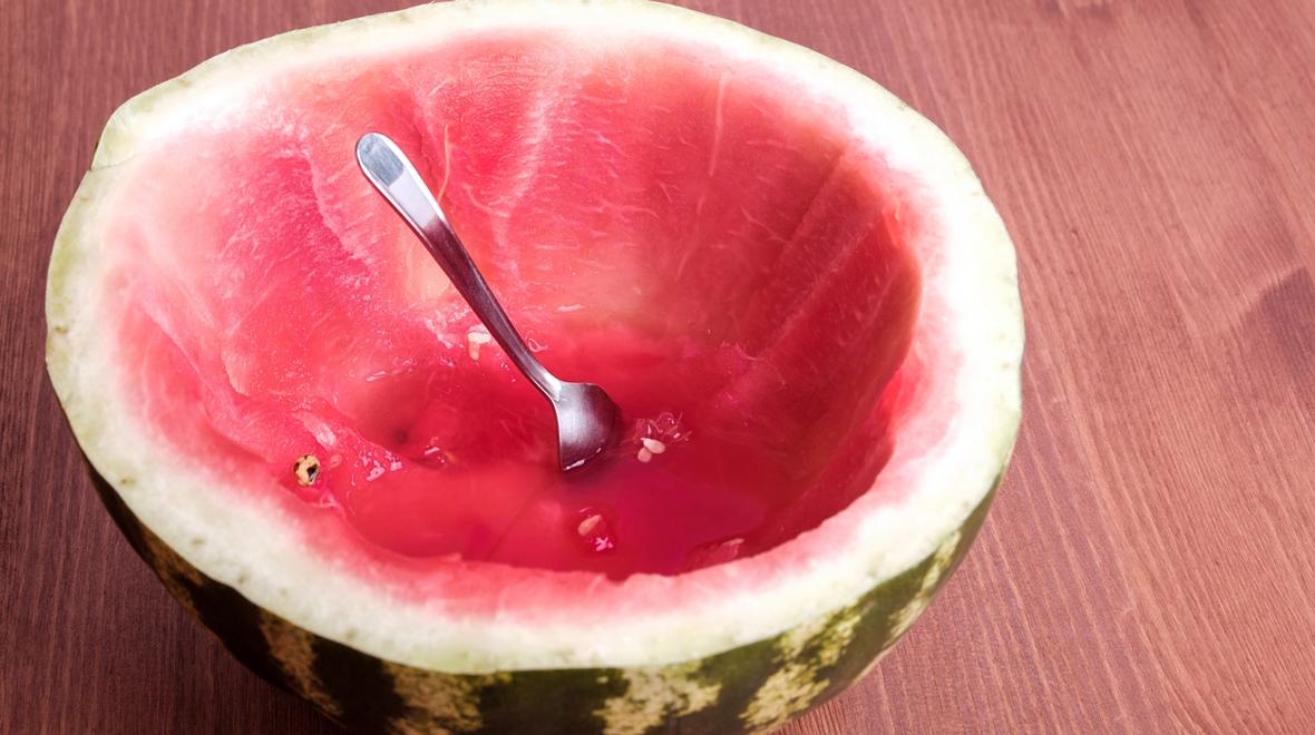 Watermelon rind carved out ready to be used to make slime a messy outdoor art project