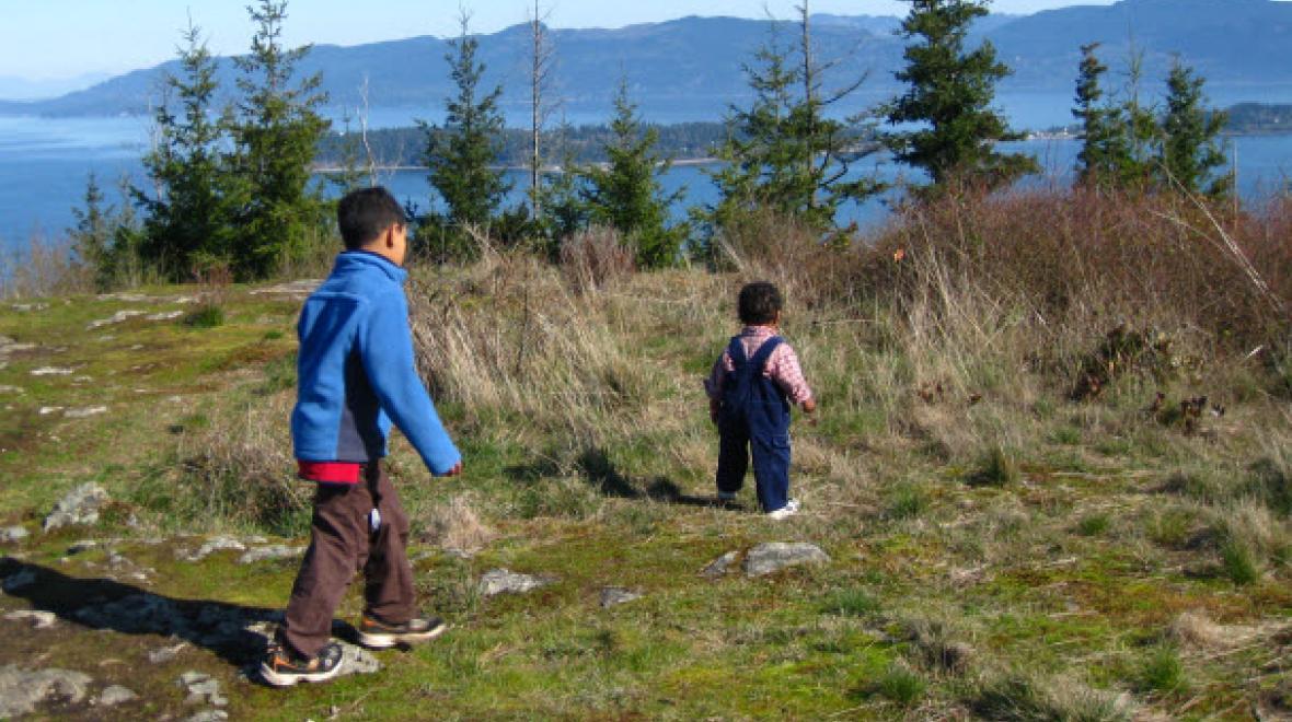 Two kids on a kid-friendly hike on Guemes Mountain near Seattle