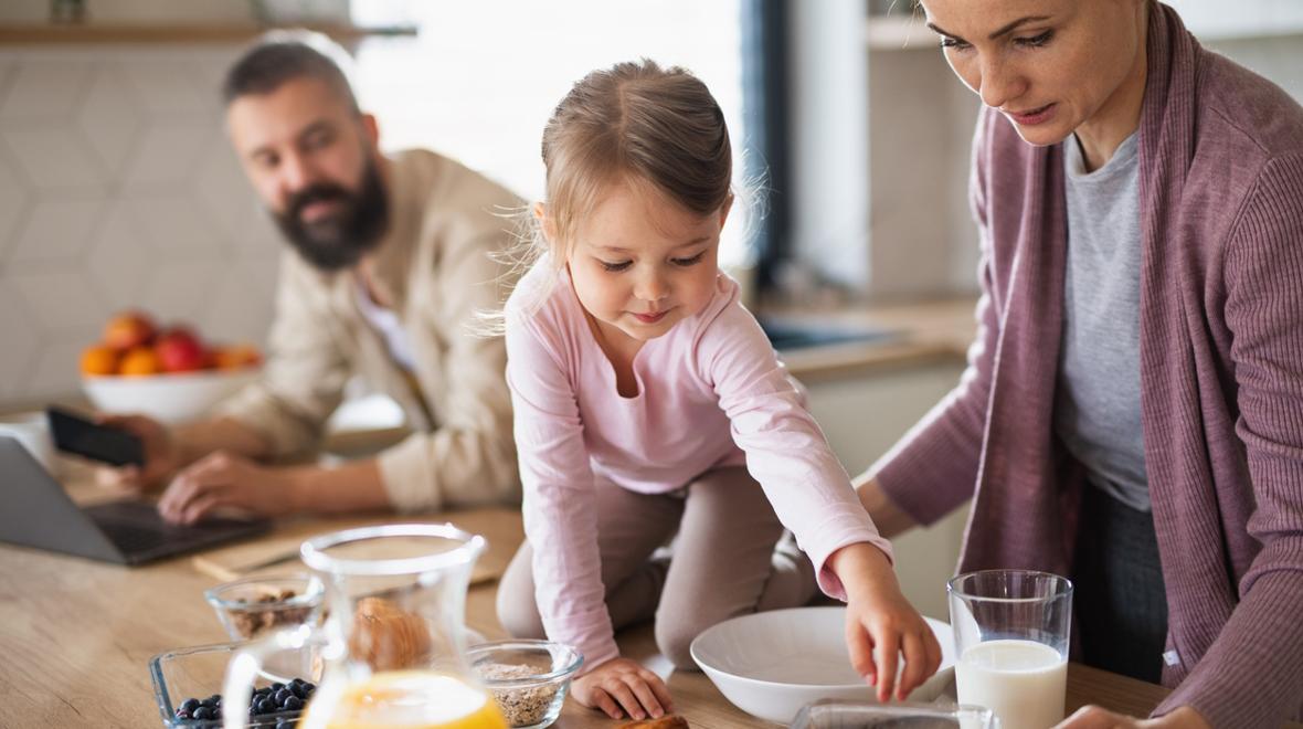 Family sharing a dairy-rich breakfast together on a busy morning