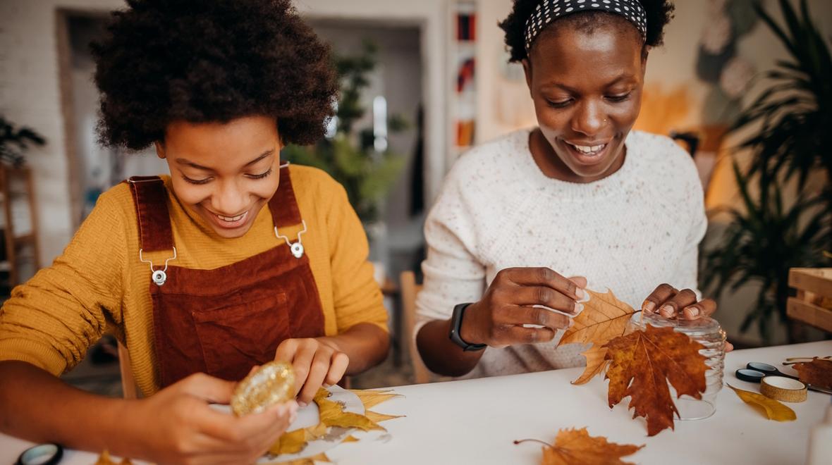 Two women working on call crafts together