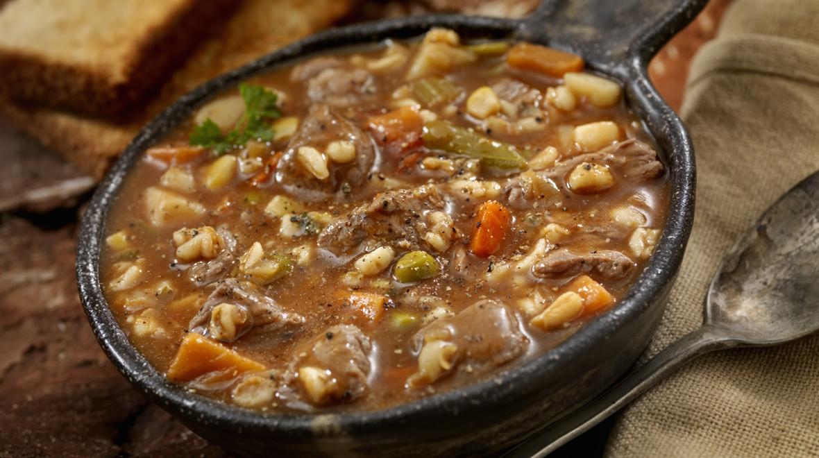 a bowl of beef and white bean soup