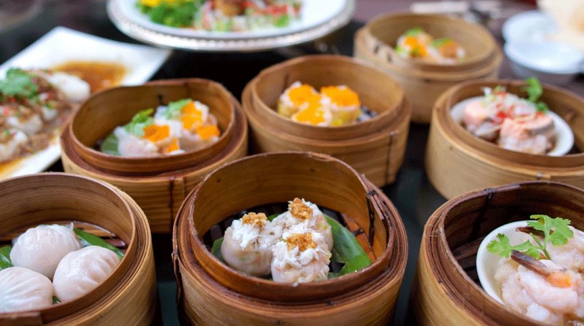 Bamboo baskets filled with different dumplings at a Seattle dumpling restaurant