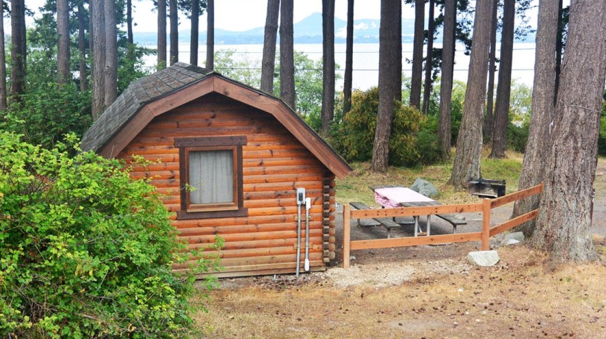 exterior of Bay View State Park cabin with water views, a cabin rental for Seattle-area families