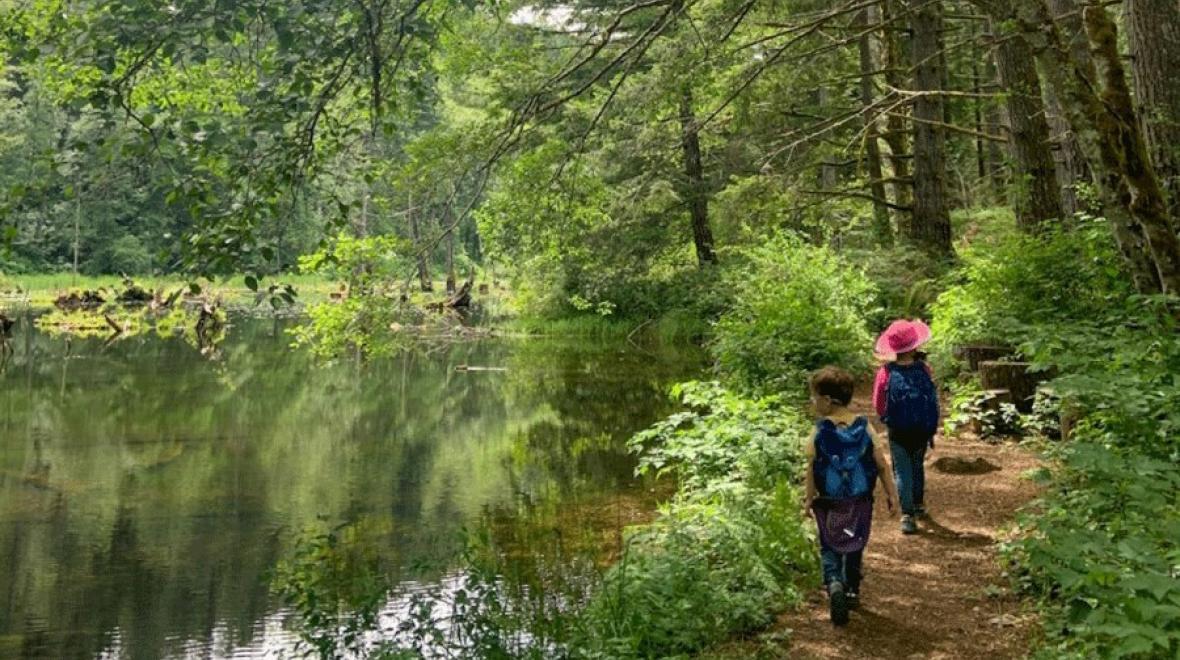 two kids on a hike in Kitsap County, a fall activity the whole family will love