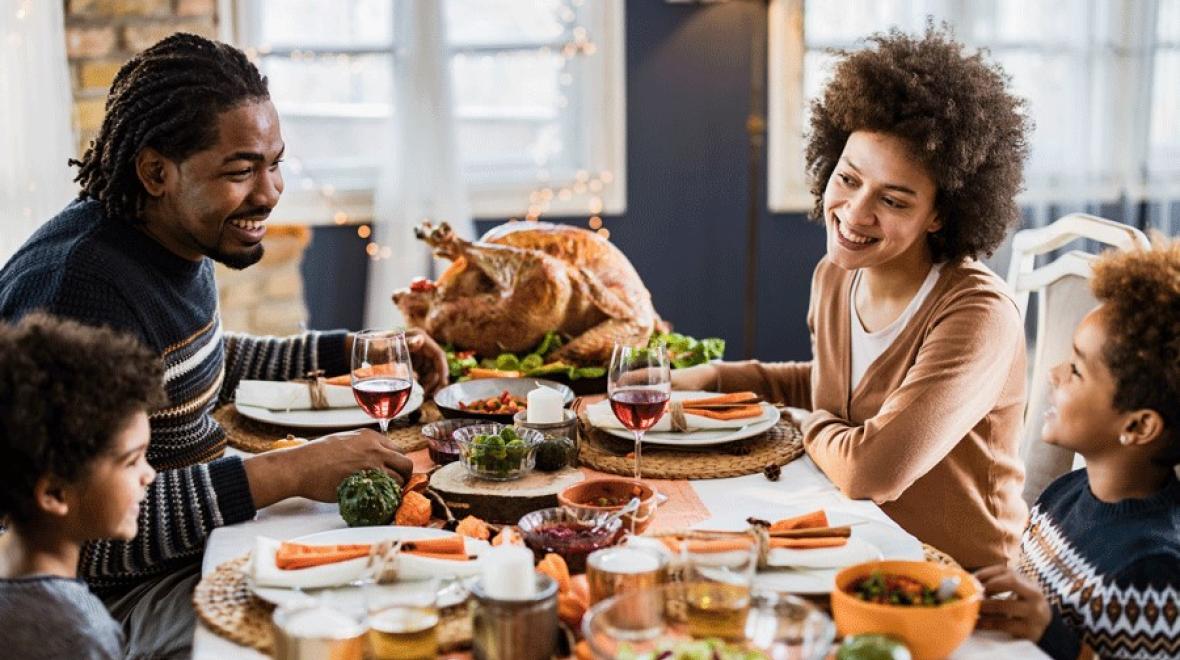 Family eating Thanksgiving dinner from a Seattle-area restaurant serving Thanksgiving dinner and takeout