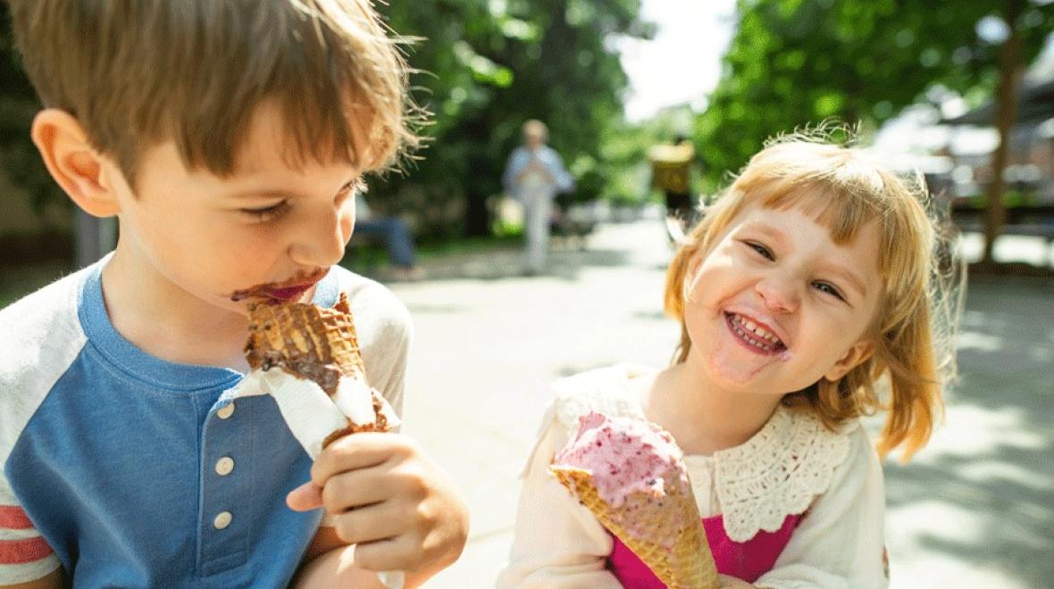 two kids eating ice cream at a park in Enumclaw