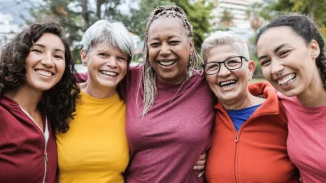 A group of women wearing colorful shirts don't think too much about how they look