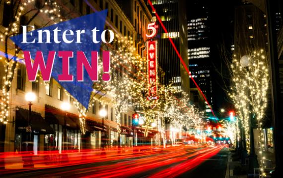 "Enter to Win!" text over the 5th Avenue Theatre at night