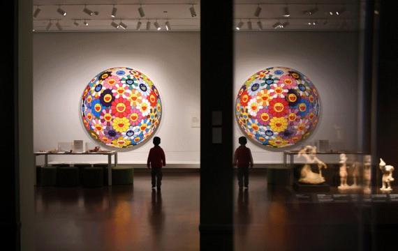 young boy walks in the Seattle Asian Art Museum, a local museum you can visit for free or at a discounted rate