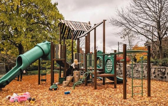 young girl climbing playground structure at Lakewood Park, a fun activity for Seattle families this weekend