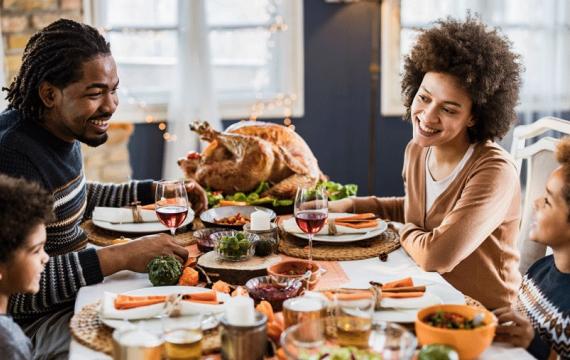 Family eating Thanksgiving dinner from a Seattle-area restaurant serving Thanksgiving dinner and takeout